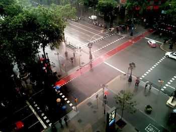 High angle view of people crossing road