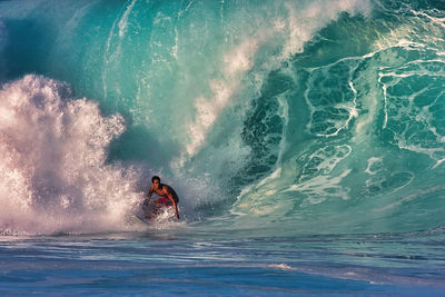 Man surfing in sea