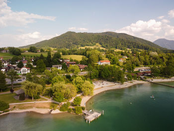 High angle view of townscape and mountains against sky