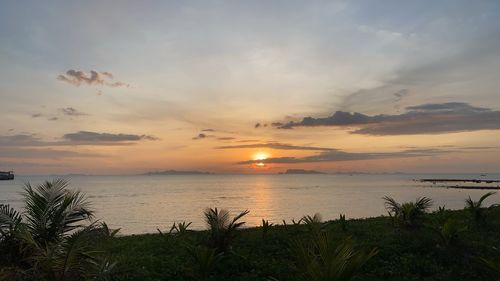 Scenic view of sea against sky during sunset