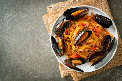 High angle view of fish in bowl on table