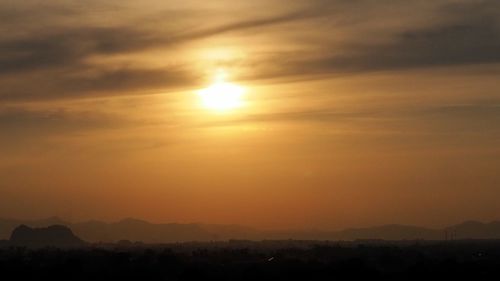 Scenic view of silhouette landscape against romantic sky at sunset