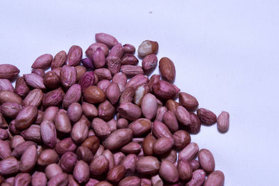 High angle view of grapes over white background