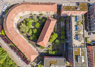 High angle view of road amidst buildings in city