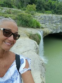 Portrait of woman wearing sunglasses