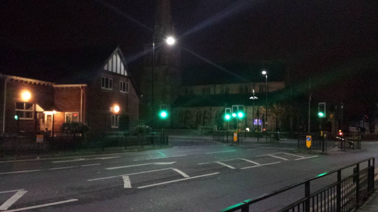 illuminated, night, street light, transportation, lighting equipment, road, the way forward, street, road marking, built structure, architecture, city, building exterior, guidance, outdoors, road sign, empty, sky, electric light, car