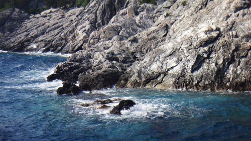 View of rock formation in sea