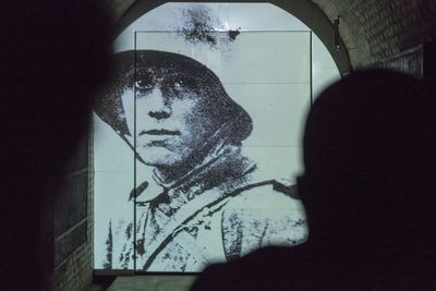 Close-up of woman against window