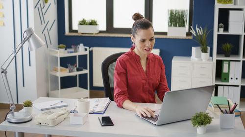 Businesswoman working in office