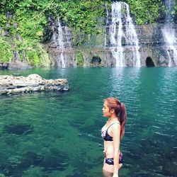 Woman standing in water