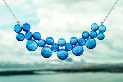 Close-up of water against blue sky