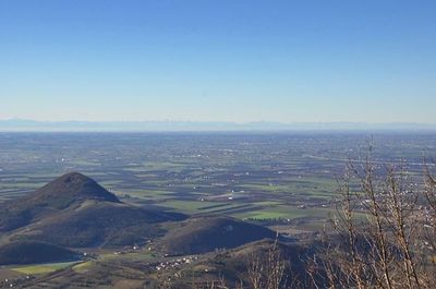 Scenic view of mountains against clear blue sky