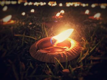 Close-up of illuminated candle