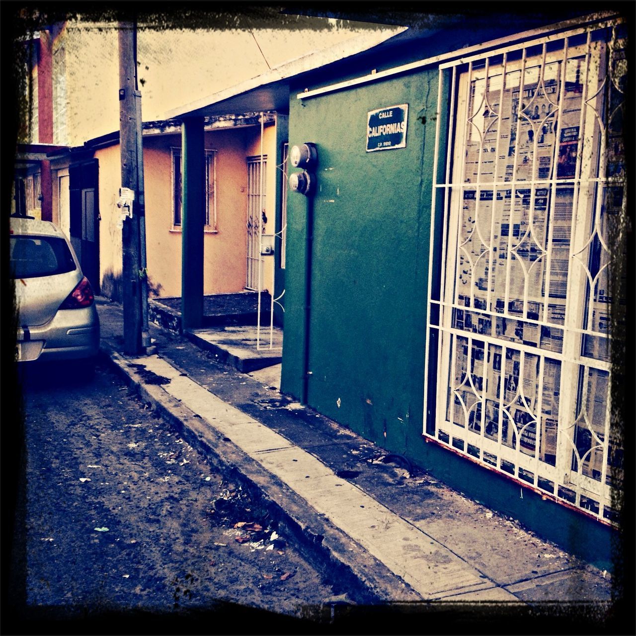 transfer print, architecture, built structure, building exterior, abandoned, auto post production filter, transportation, obsolete, window, damaged, door, run-down, old, graffiti, deterioration, mode of transport, day, house, closed, land vehicle