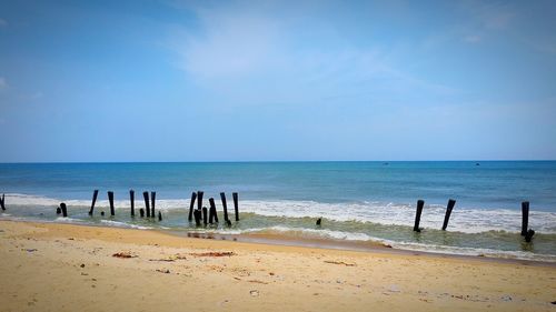 Scenic view of beach against sky