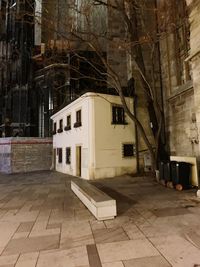 Empty alley amidst buildings in city