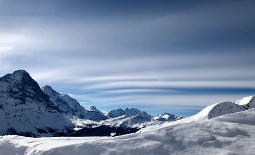 Snowcapped mountains against sky