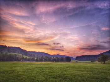 Scenic view of landscape against sky during sunset