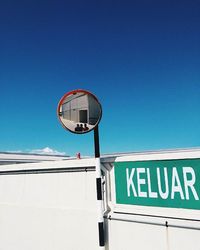 Low angle view of built structure against clear blue sky