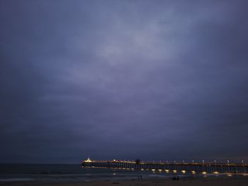 Scenic view of sea against sky at night