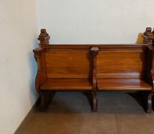 Wooden chair against wall at home