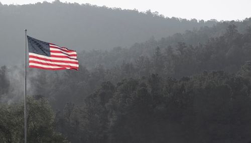 American flag against mountain