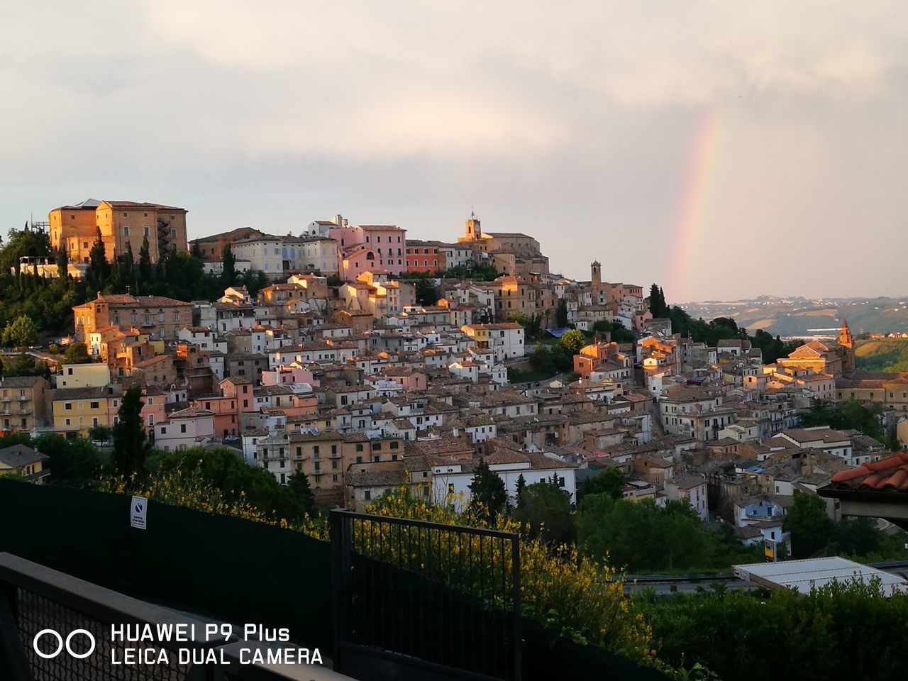 VIEW OF RAINBOW OVER CITY