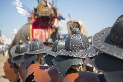 Rear view of people in costume during traditional festival