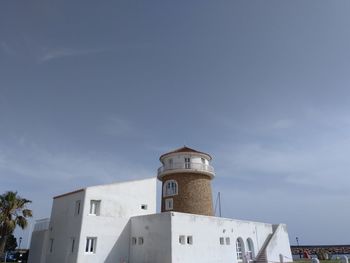 Low angle view of lighthouse against clear sky