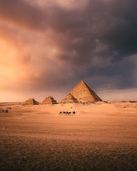 Scenic view of the pyramids and sky during sunset