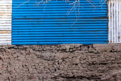 Closed shutter of wall of building