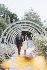 Young couple walking outdoors