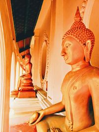 Low angle view of buddha statue