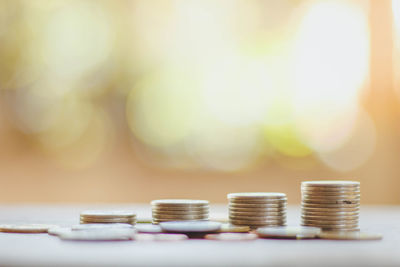 Close-up of coins on table