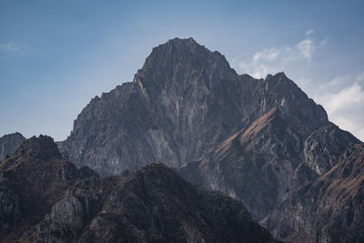 Scenic view of rocky mountains against sky