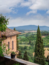 Rural landscape seen from the heights of the medieval town of san gimignano - italy.