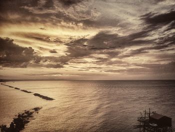 Scenic view of sea at sunset