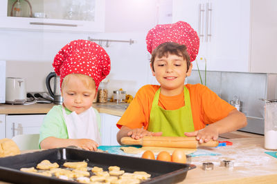 Two boys bake