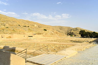 Scenic view of arid landscape against sky