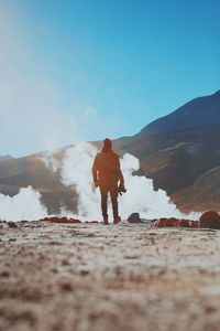 Full length of woman on mountain landscape