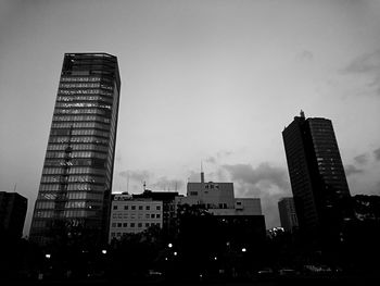 Low angle view of modern buildings against sky