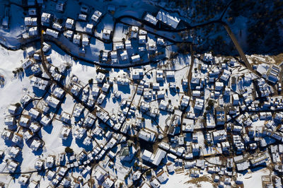 High angle view of snow on shore during winter