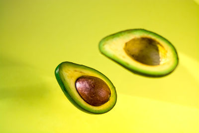 Close-up of fruit against green background