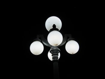 Low angle view of illuminated street light