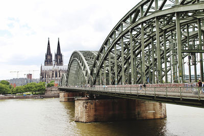 Bridge over river rhine in cologne with cathedral 