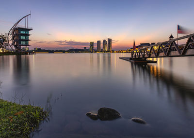 View of bridge over river in city