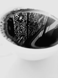 High angle view of text on glass