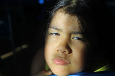 Close-up portrait of bored girl