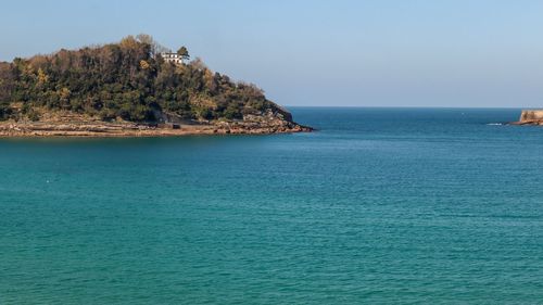 Scenic view of sea against clear sky