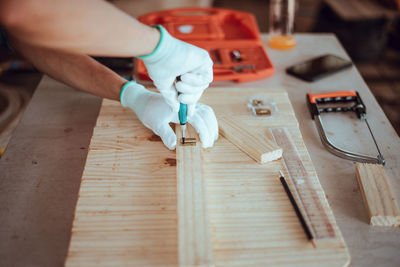 High angle view of man working on table